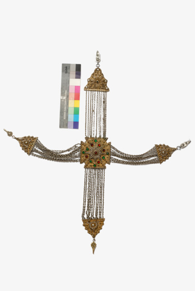 Gilded crossed kiousteki of the chest, with wiry decoration and coloured stones 