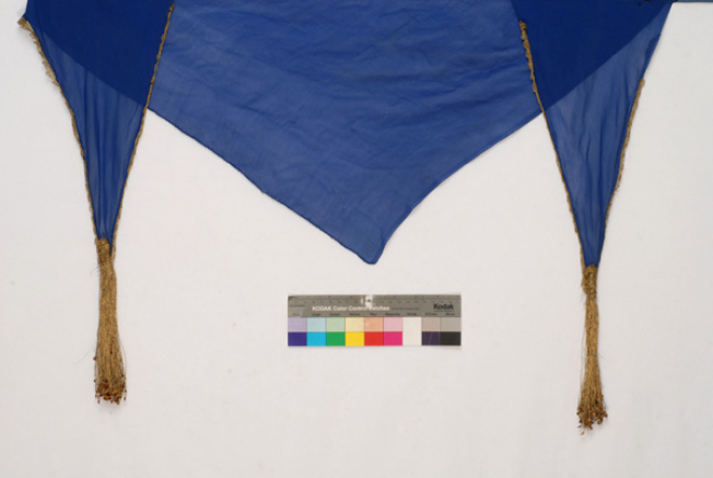 Magnandi, small triangle, silk kerchief in blue colour with gold tassels at the edges
