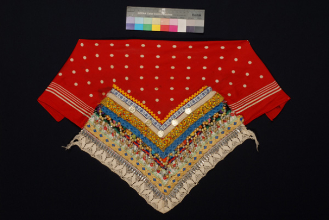 Additional plastron made of red cotton printed fabric with applique decoration