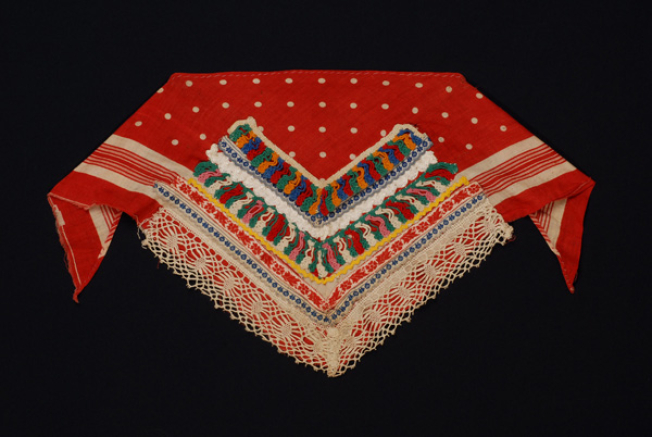 Triangle additional plastron made of red cotton printed fabric with applique decoration