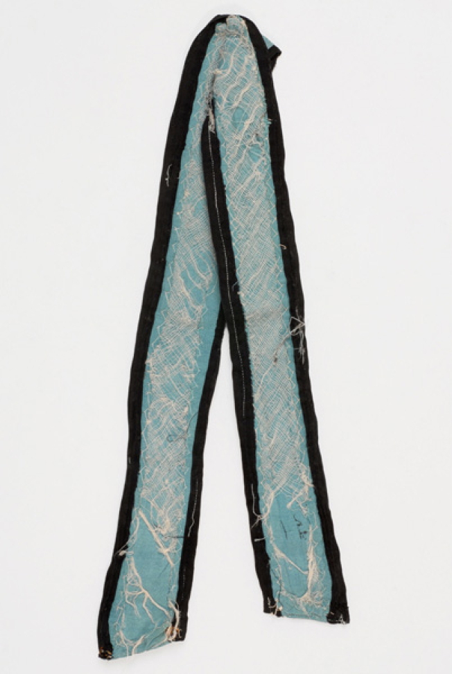 Belt of a dancer with sistrum, back