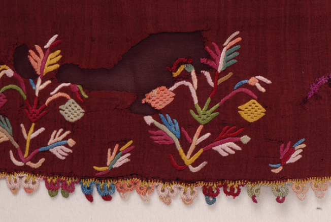 Border, detail of the decorative motif and the lace