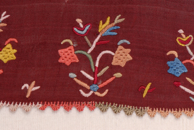 Border, detail of the decorative motif and the lace