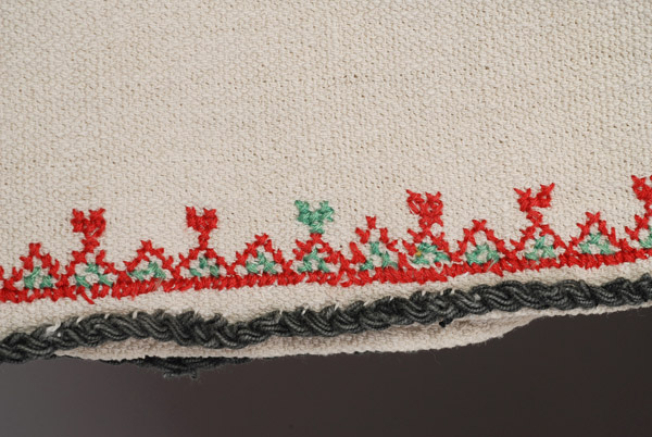Opening of the sleeve, detail of embroidered decoration 