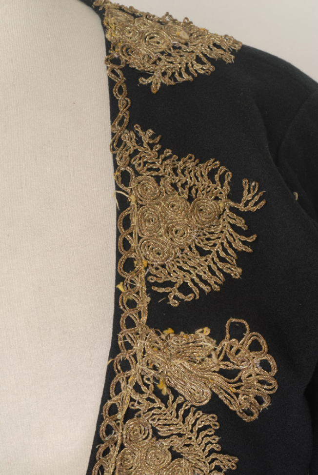 Detail of the gold embroidery at the plastron