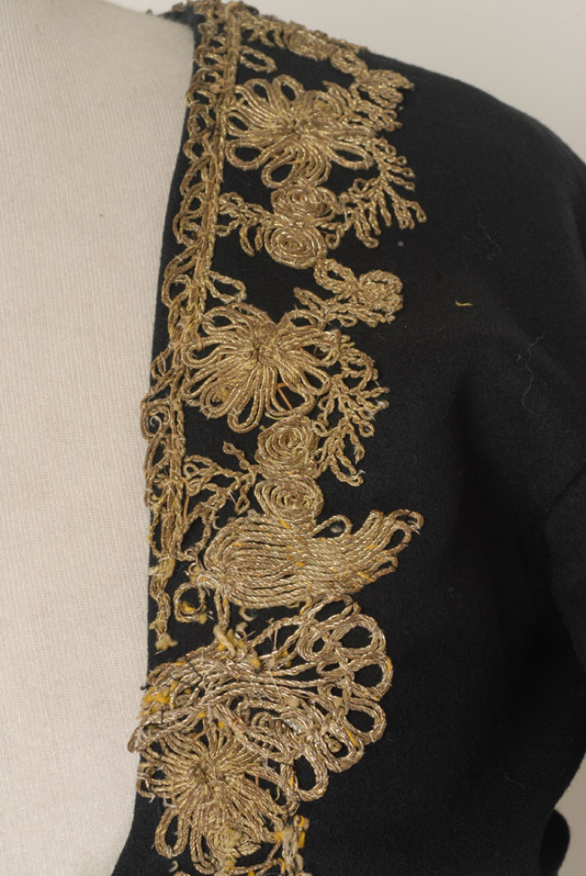 Detail of the gold embroidery at the plastron