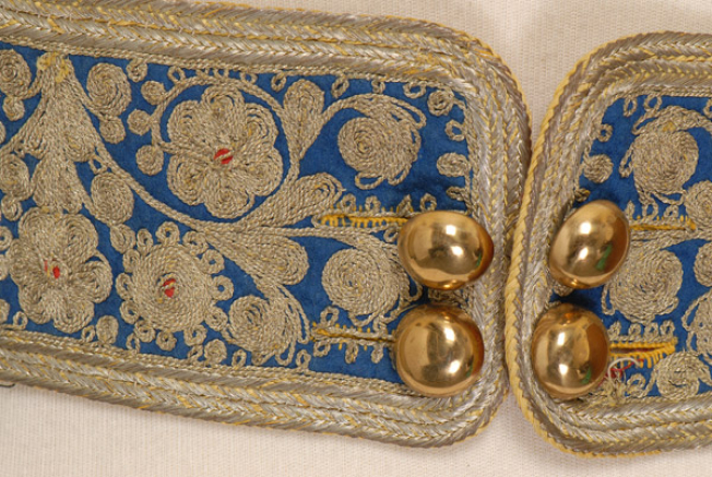Detail of the decoration of the tongue and fioumbes, cuff-links