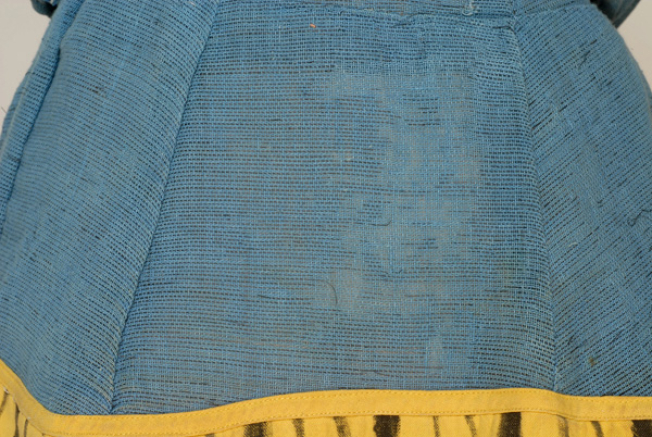Fabric of the skirt under the applique decoration