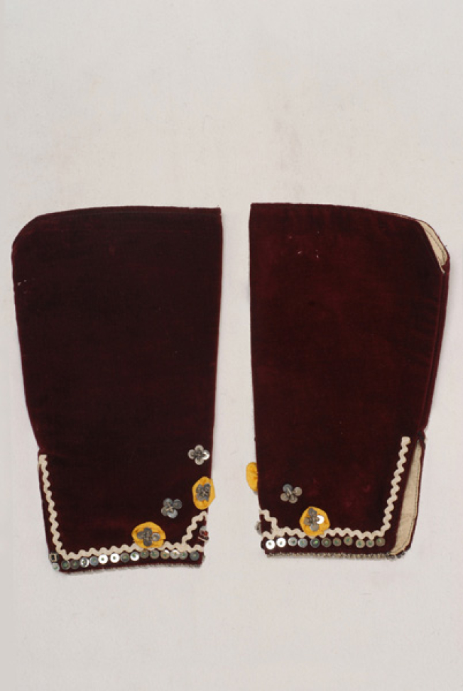 Pair of sleeves made of red velvet, ornamented at the hem with rosettes, spangles, beads and zig-zag off-white braid