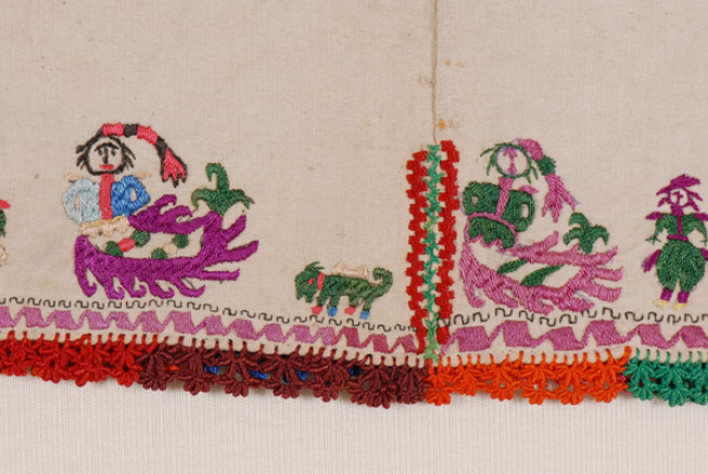 Mermaids, dog and embroidery of the latzouli