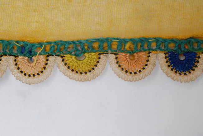 Multicoloured bibila (crocheted lace), reverse side