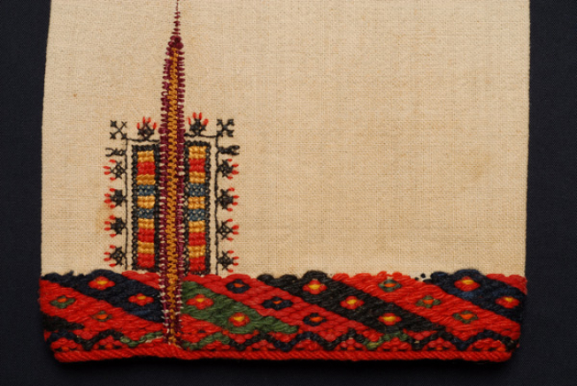 Detail of the embroidered decoration at the sleeve border and ragouzela, lace joint at the panel