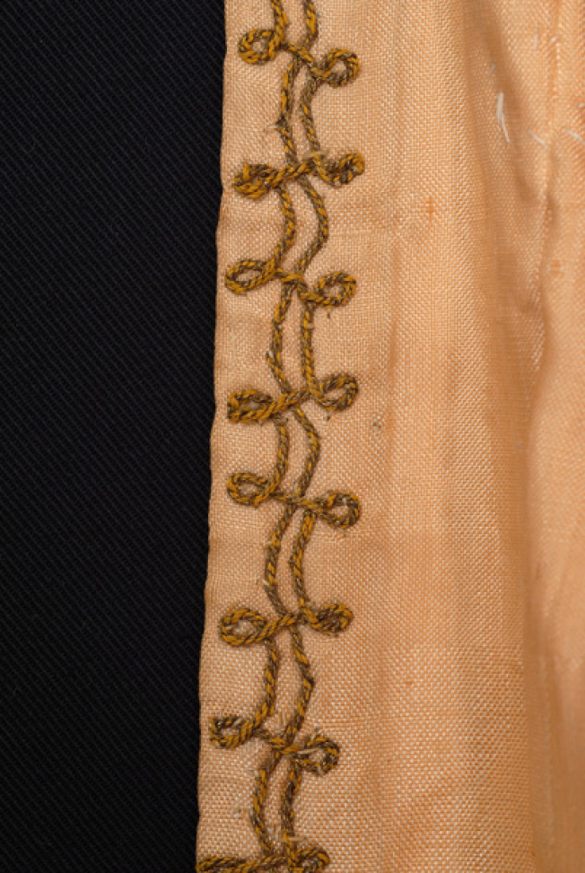 Detail of the applique decoration with terzidiko gold embroidery