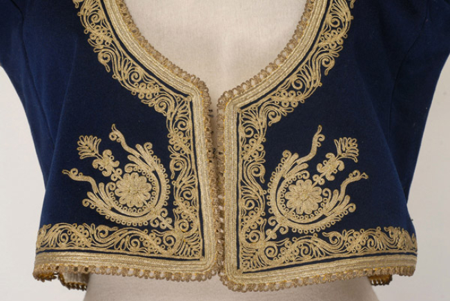 Front panel, detail of the gold embroidered decoration