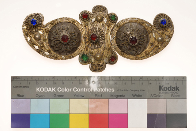 Wiry buckle with multi-leafed rosettes and coloured glass stones 