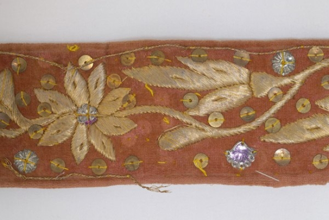 Detail of the decoration, spangles and stars, gold thread