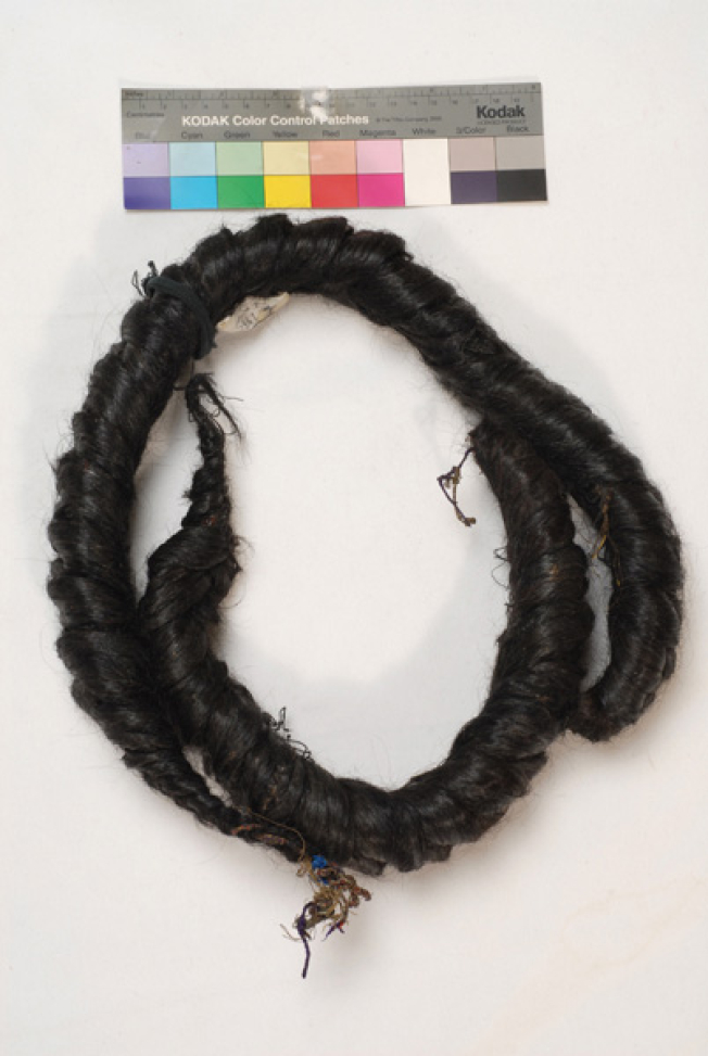 Perouklia or kossidia, two thick braids (kossa) arranged into a pattern. Accessory of an older type of bridal headdress from Metsovo