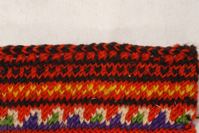 Upper part of the slleves, detail of the jacquard knitting