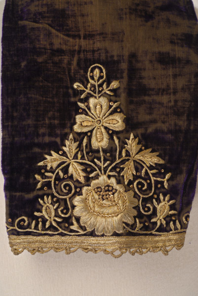Sleeve, detail of the gold embroidered decoration 