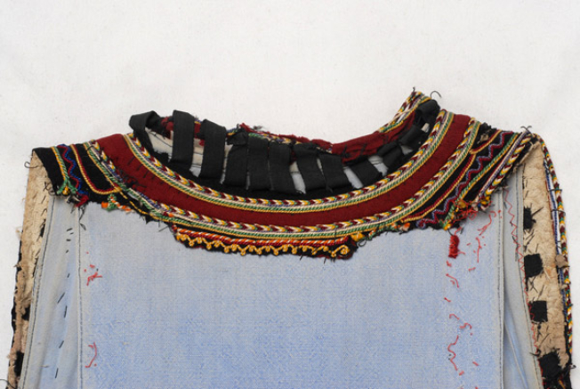 Decoration at the back part of the neckline