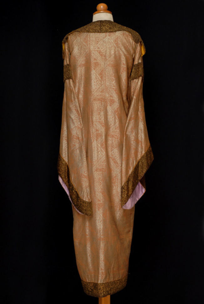 Loroto, revetted bridal dress, back