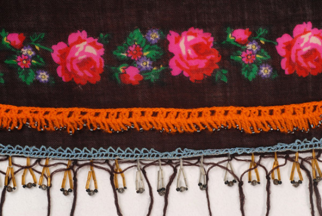 Detail of the applique decoration with bought tanteles (laces)
