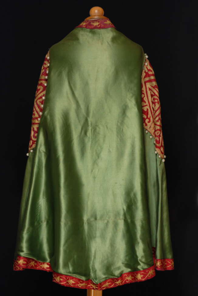 Ploumatos, chrysotavlos and revetted women's cloak, back 