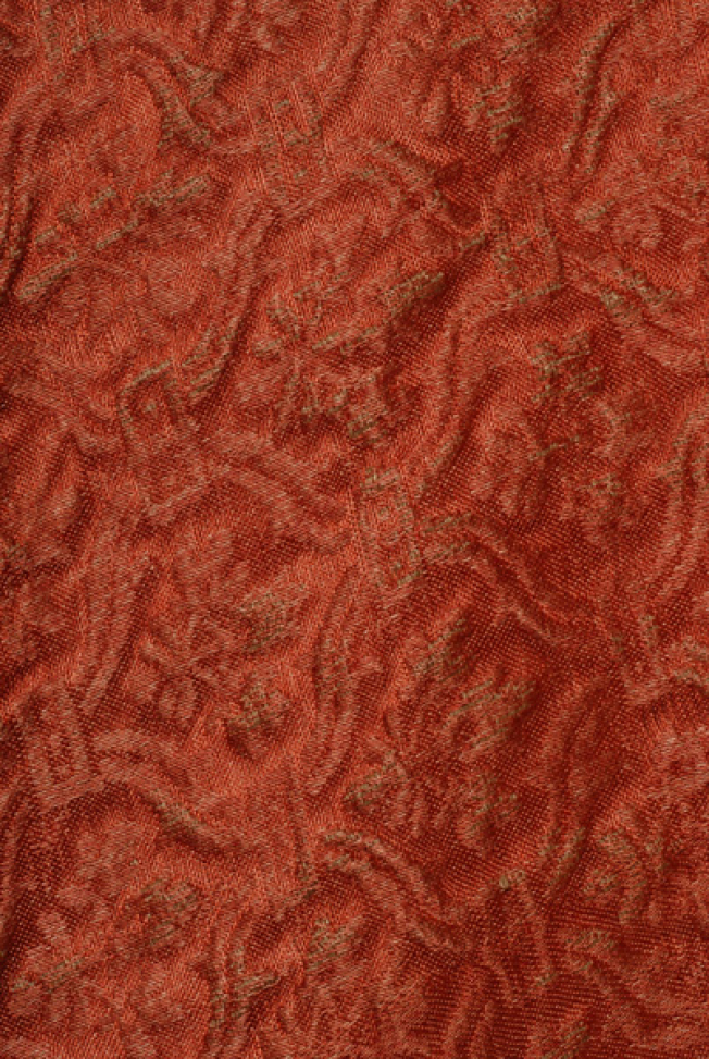Detail of the rich brocaded fabric
