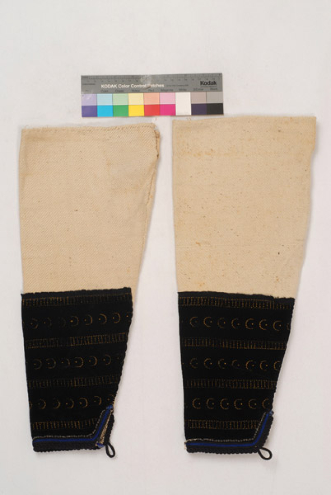 Pair of sleeves made of woollen woven fabric, covered at the bottom part with velvet fabric with printed decoration