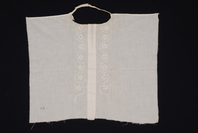Plastron, pectoral piece of fabric with white embroidery