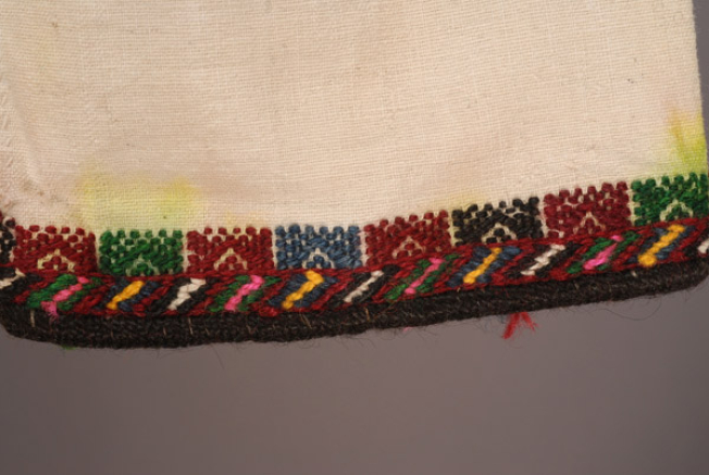 Detail of the embroidered decoration at the hem of the sleeve: namet, pat and veika