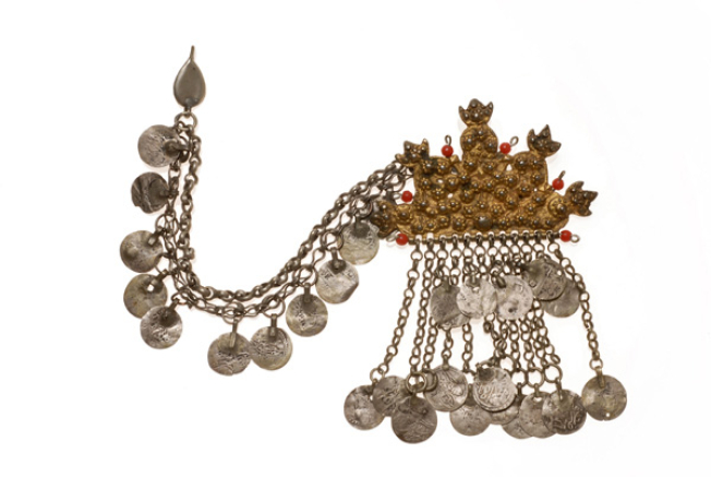 Kitka or korona, triangle gold plated head ornament with stylized vegetal and zoomorphic decoration.
