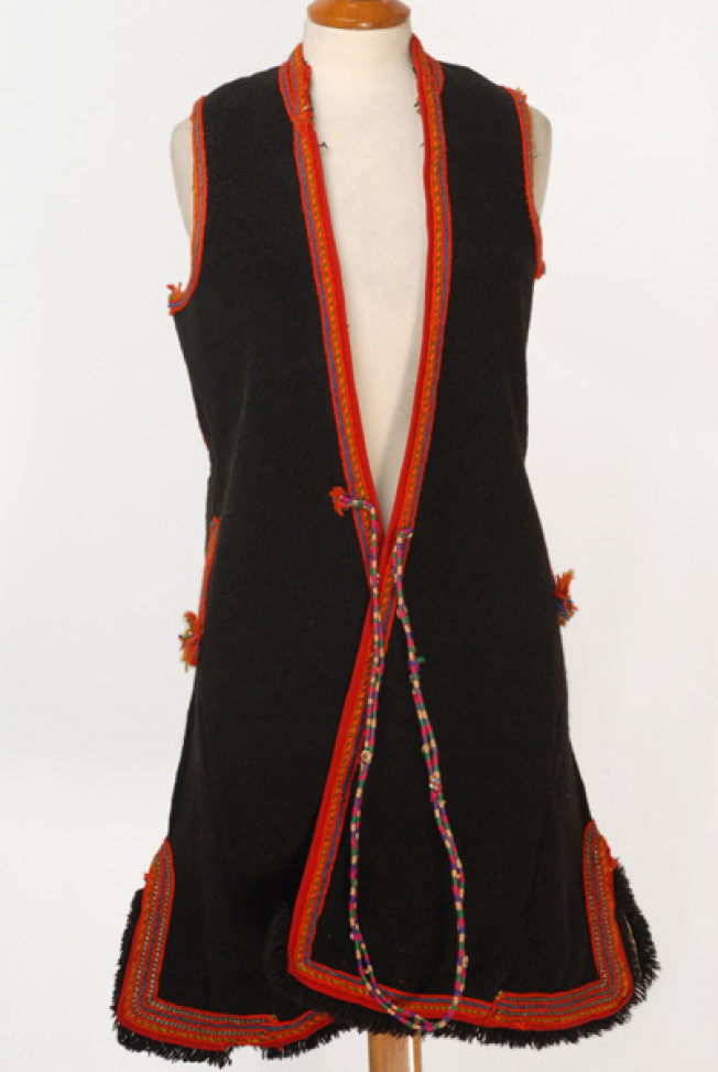 Woollen sigouna, sleeveless overcoat made of saddle blanket decorated with colourful seradia and silver cordons
