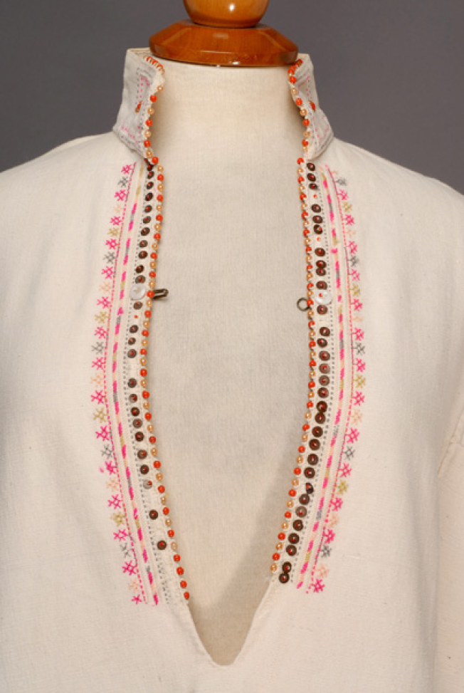 Plastron, detail of the applique and embroidered decoration 