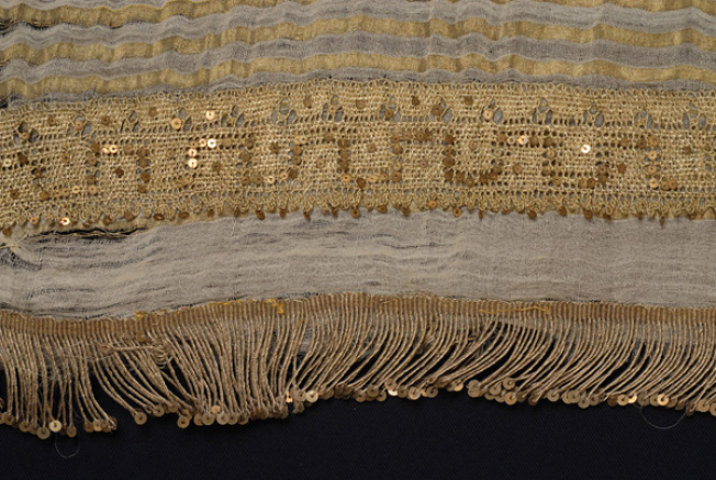 End of bolia, applique decoration with gold fillet and spangles secured with darning stitch