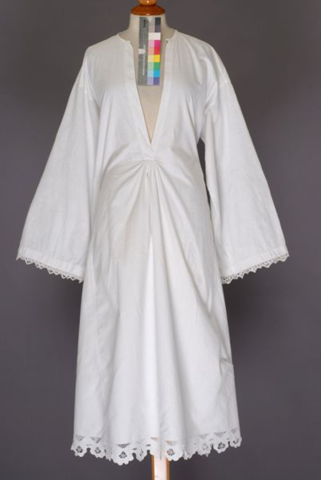 White chemise made of fine calico and crafted with white open-work embroidery