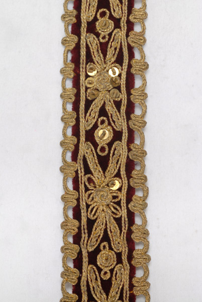 Detail of the gold embroidered decoration with tichrili, spangles, tir-tir (lustring) and a gold cord