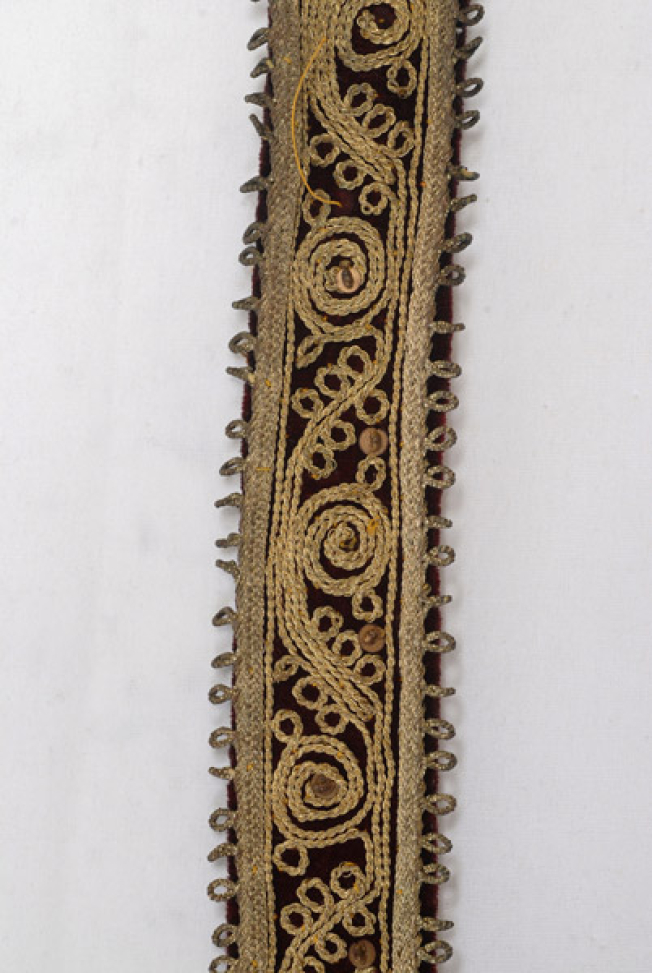 Detail of the gold embroidered decoration with tichrili, spangles, tir-tir (lustring), a cordon and gold cord