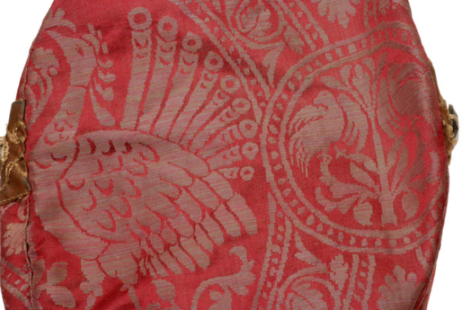 Pattern of the rich brocaded fabric: peacock, birds