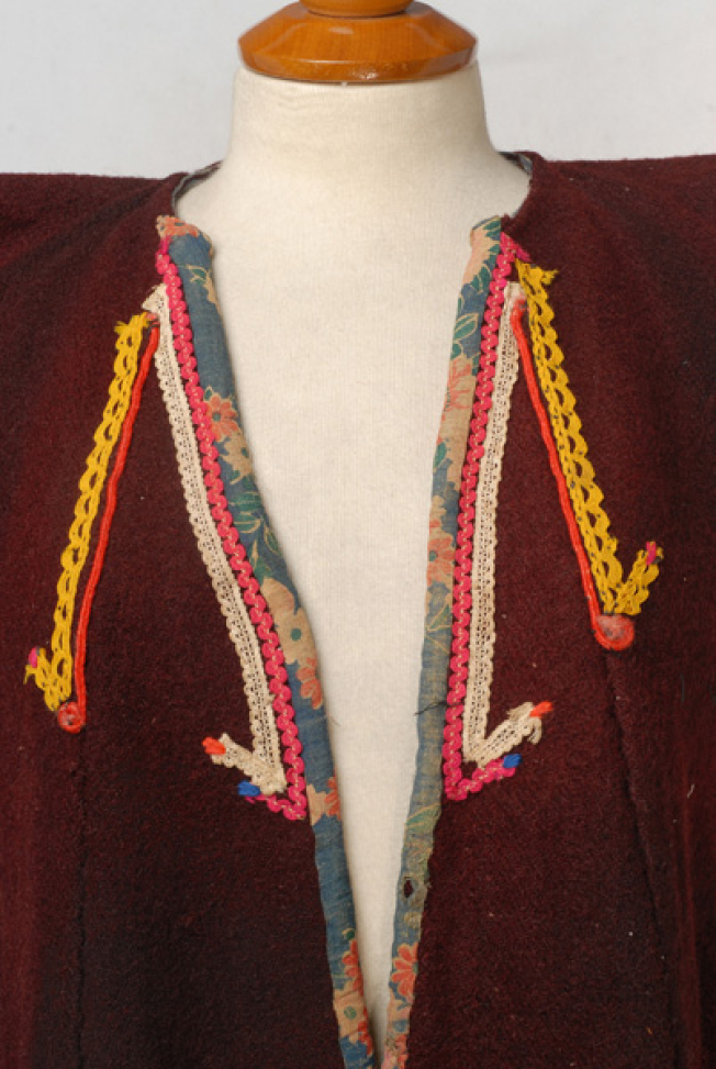 Detail of the applique decoration at the chest