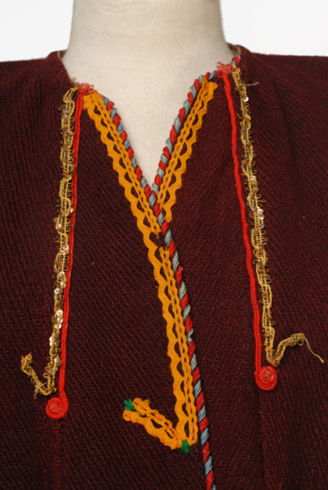 Detail of the applique decoration at the chest