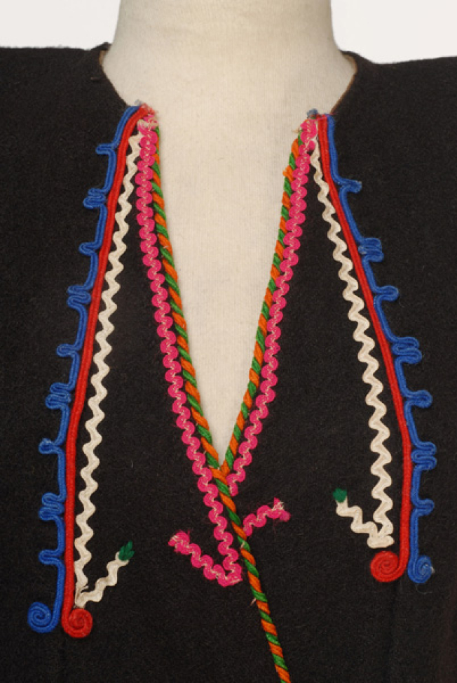 Detail of the applique decoration at the chest