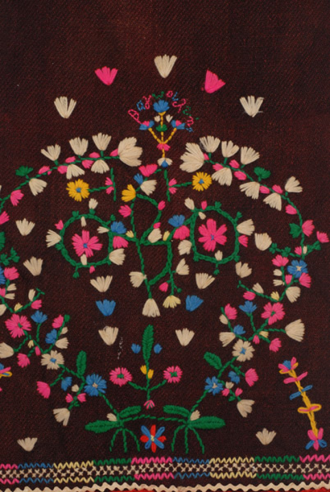 Detail of the embroidered decoration, composition of vegetal motifs