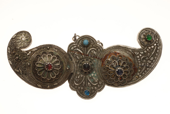 Silver forged buckle with wiry multi-leafed rosettes, coloured glass stones and turquoise 