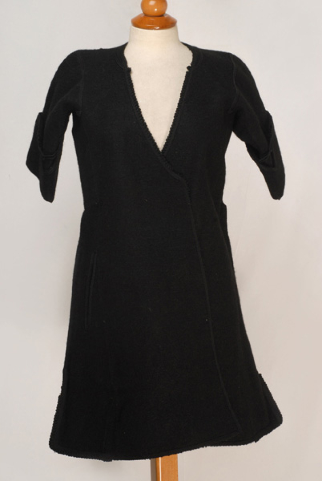 Kiourdia, inner sleeved overcoat made of black horse cloth, ornamented with plain-coloured cordons and loops
