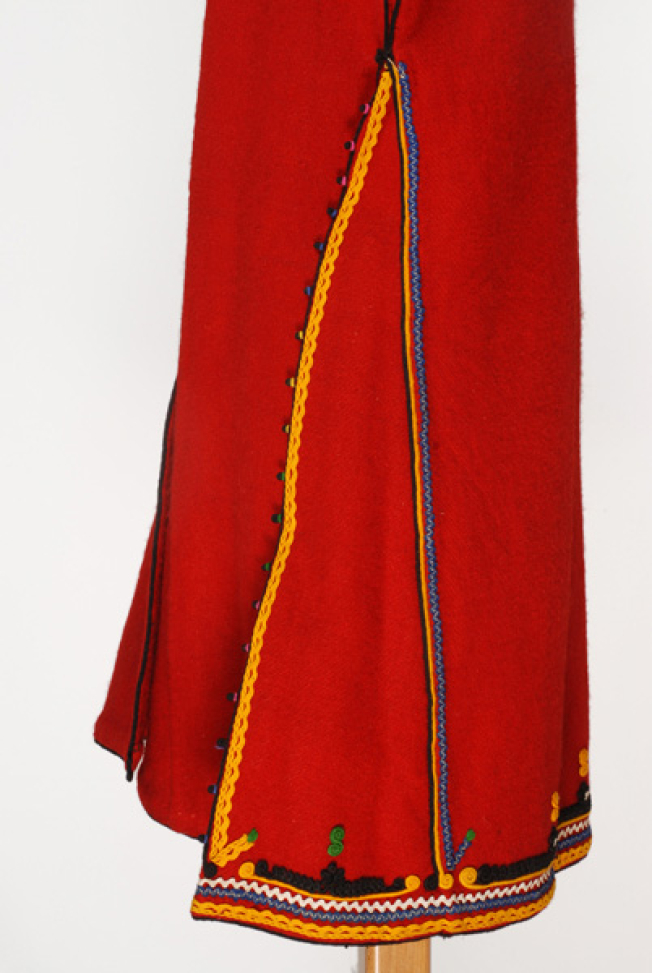 Detail of the applique decoration at the side pleat