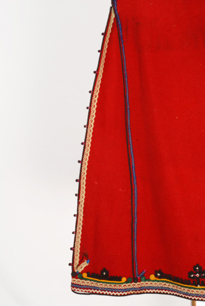 Detail of the applique decoration at the side pleat