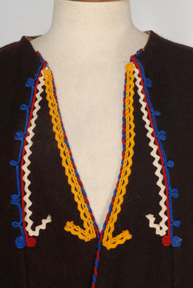 Detail of the applique decoration at the chest