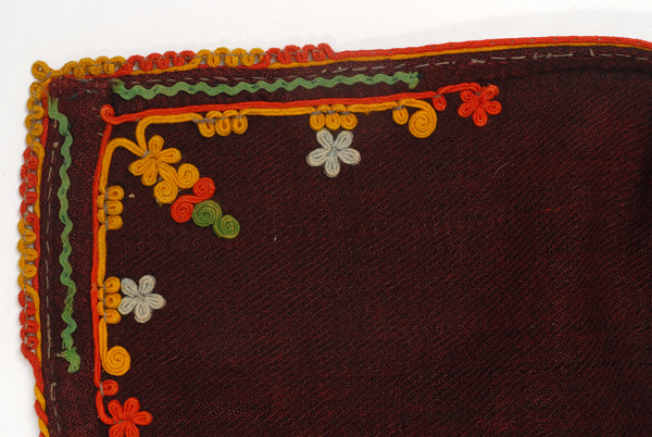 Detail of the applique decoration on the inside of the front corner.