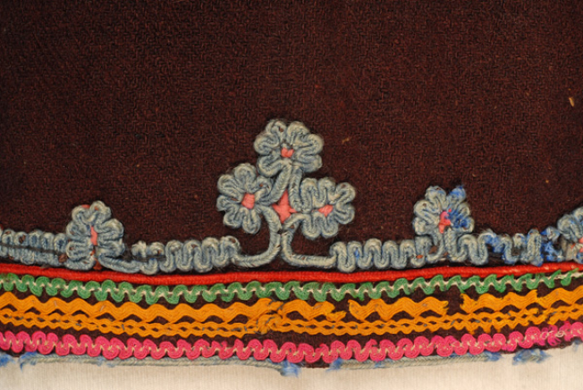 Detail of the applique decoration at the border: purchased elements and klarakia (twigs) with gaitania.